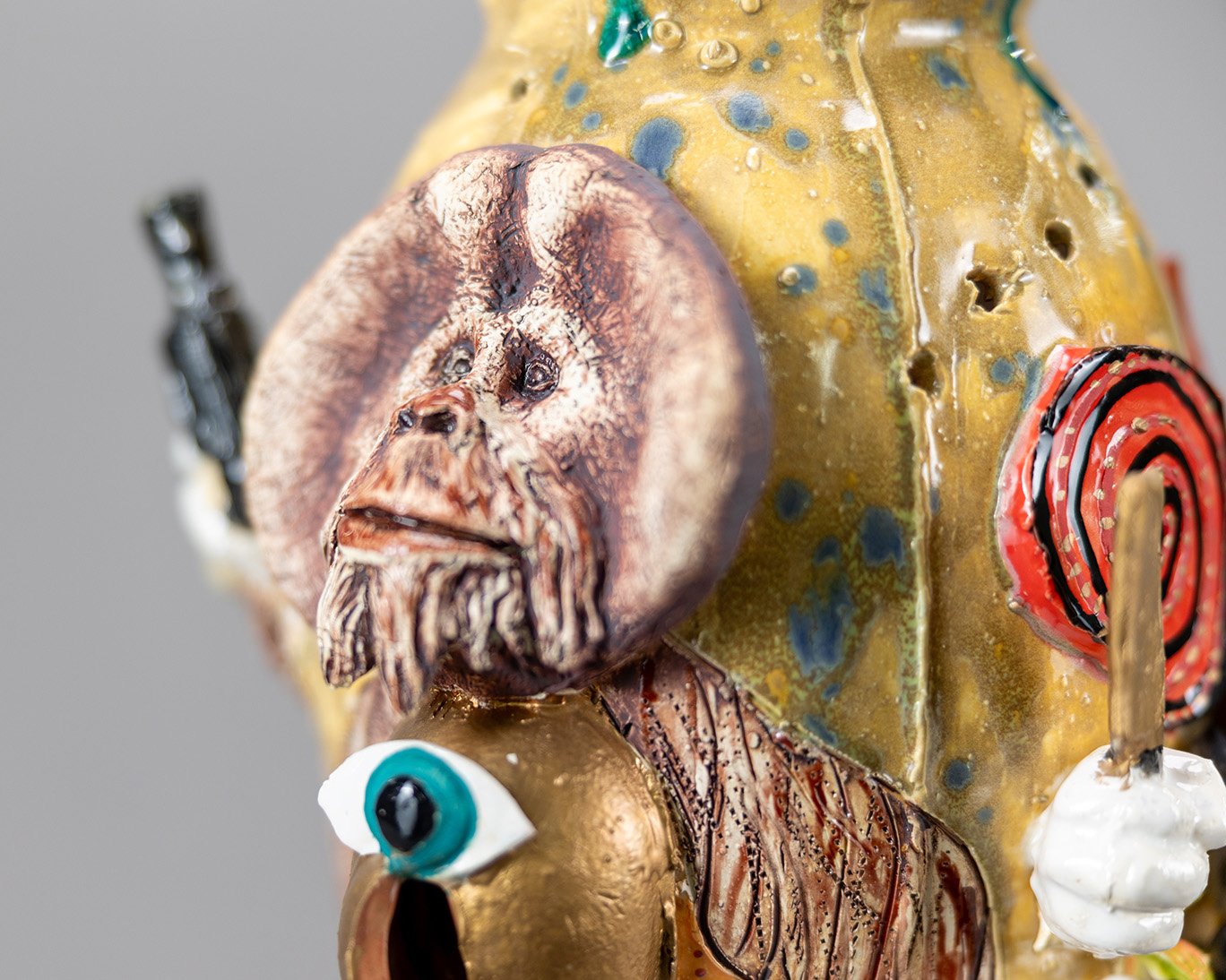 Gun Monkey, sculpture by Charlie McGrady, view 5